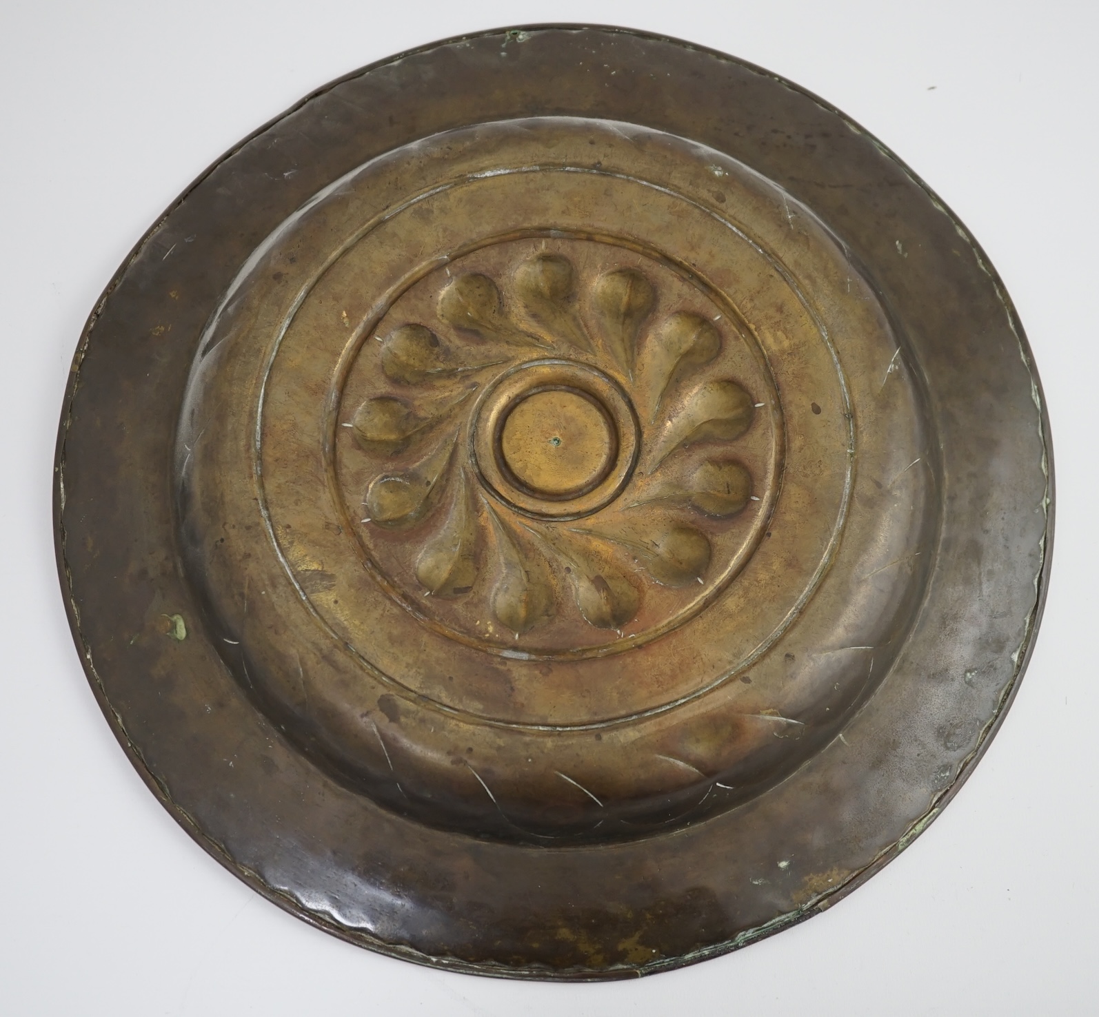 A 16th century German brass alms dish, Nuremberg, circa 1550